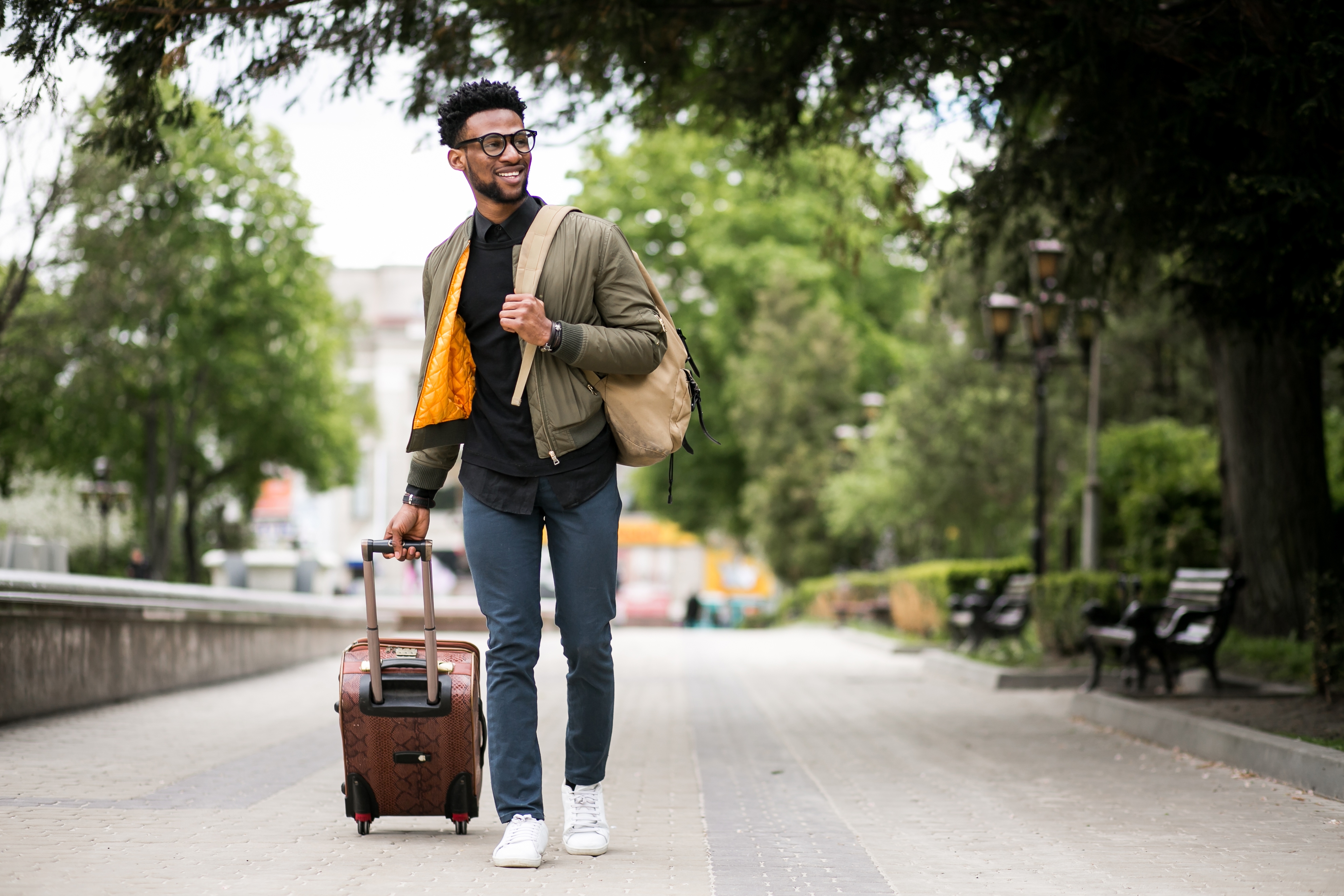 Skilled worker with luggage in urban setting
